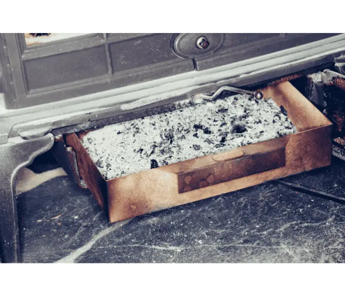 dust ash pan of wood burning stove