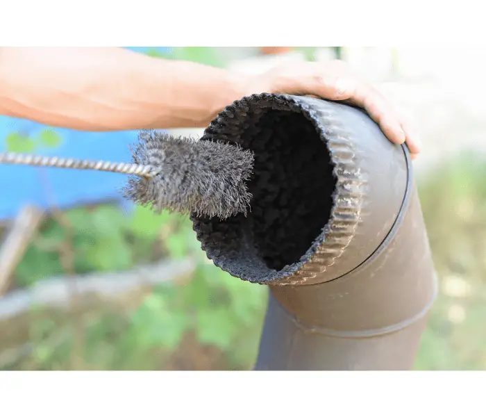 cleaning chimney pipe