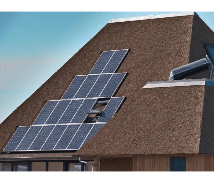 solar panels on thatched roof